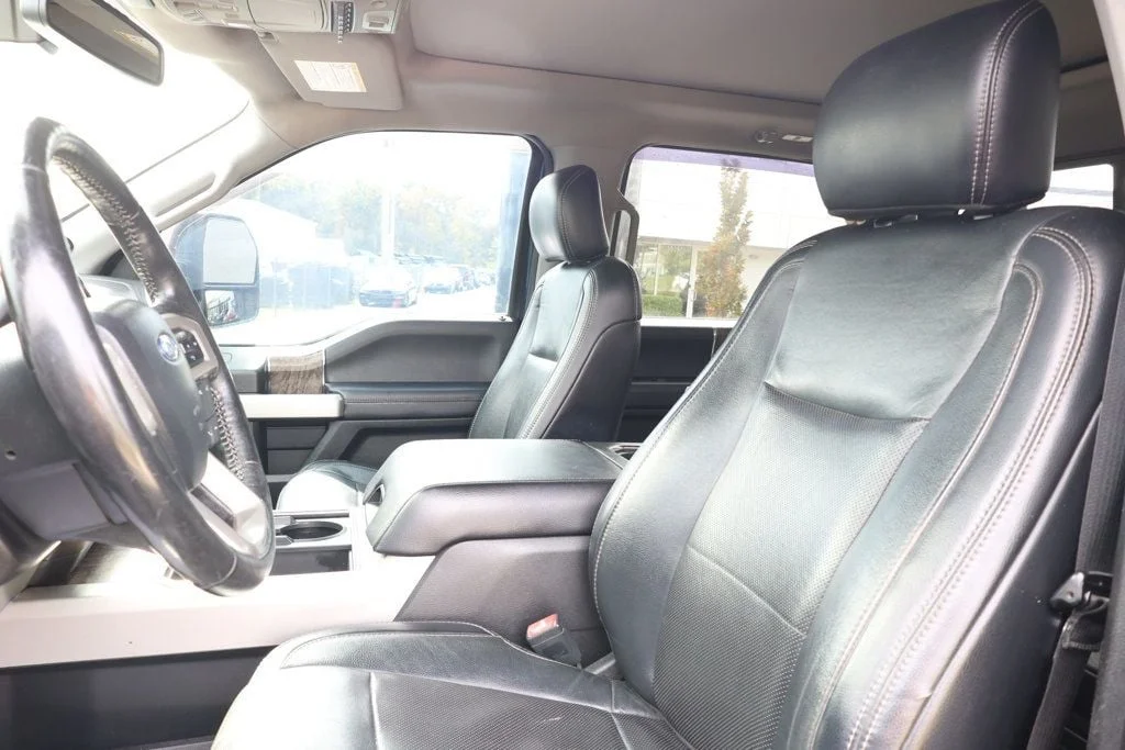 Used 2019 Blue Jeans Metallic Ford LARIAT 4WD Crew Cab 6.75