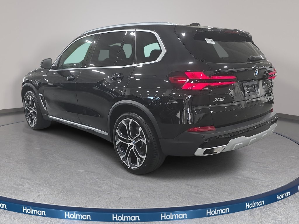 Used 2026 Black Sapphire Metallic BMW sDrive40i image 7