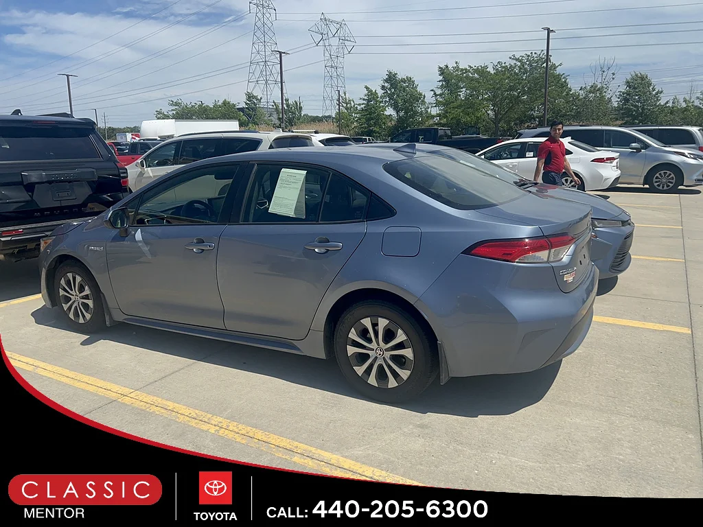 Used 2021 Celestite Gray Metallic Toyota LE 4dr Sedan image 2