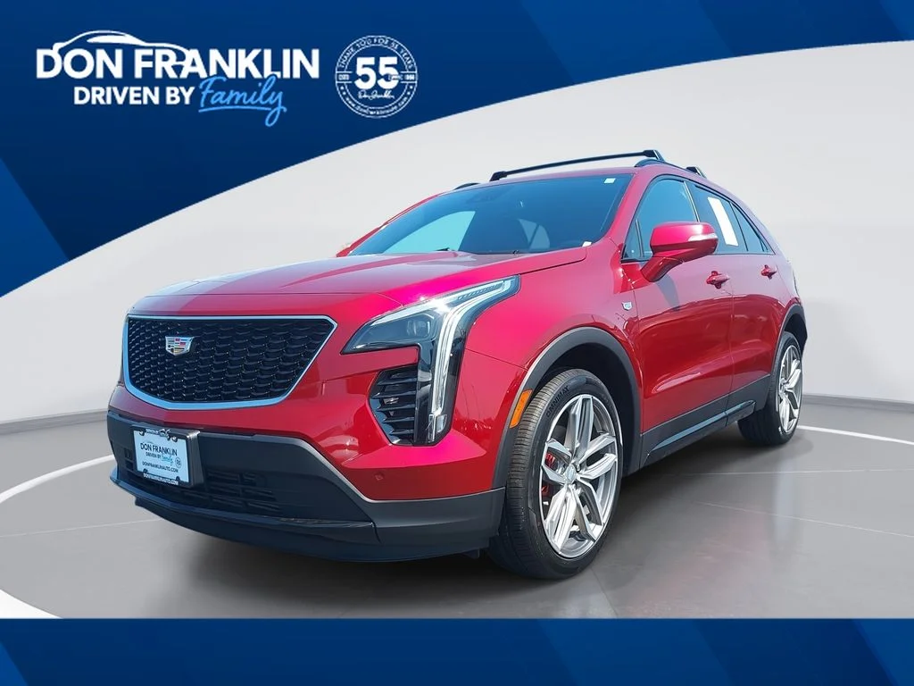 Used 2021 Red Cadillac Sport image 1
