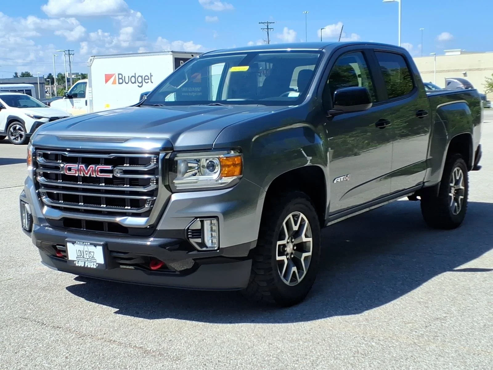 Used 2022 Satin Steel Metallic GMC 4WD AT4 with Leather image 2