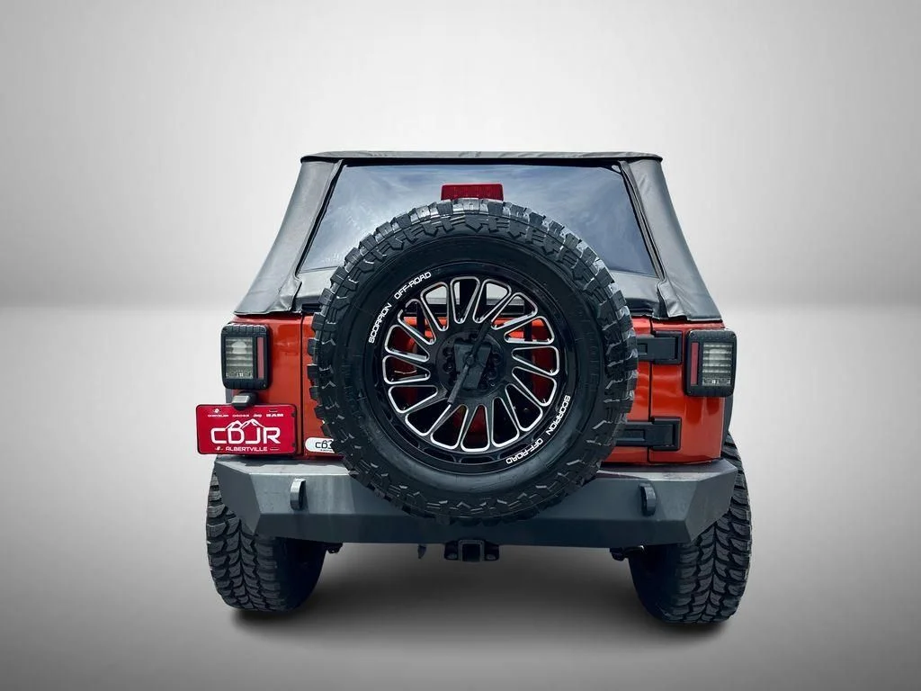 Used 2009 Orange Jeep Unlimited X image 9