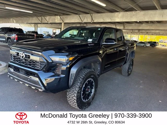 Used 2024 Black Toyota TRD Off Road image 1