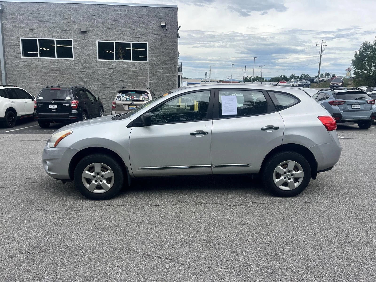 Used 2012 Brilliant Silver Nissan S image 4