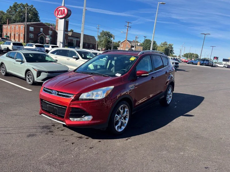 Used 2016 Orange Ford Titanium image 3