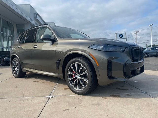 Certified Used 2024 Green BMW xDrive40i image 1