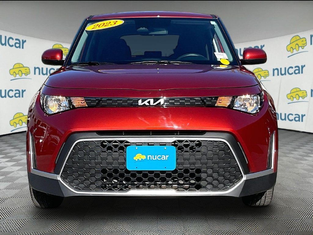 Used 2023 Orange Kia LX image 2