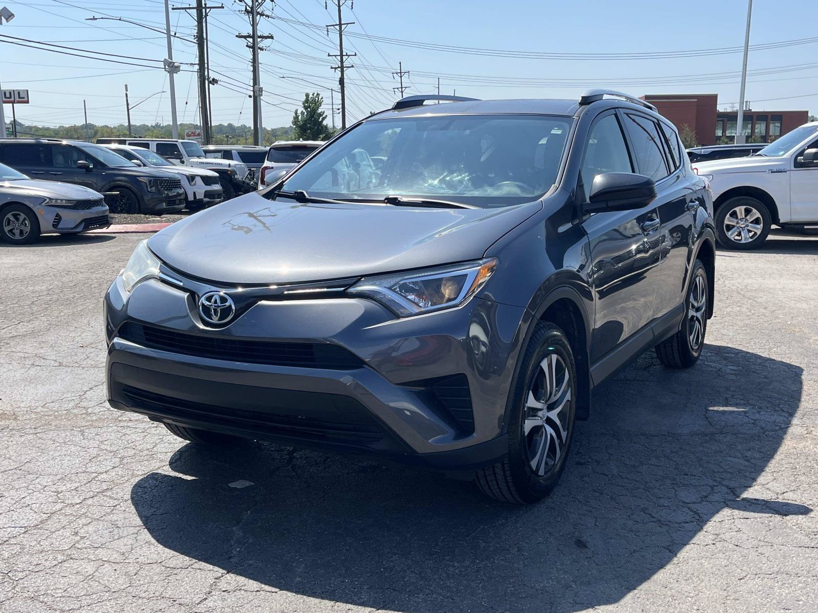 Used 2016 Magnetic Gray Metallic Toyota LE image 3