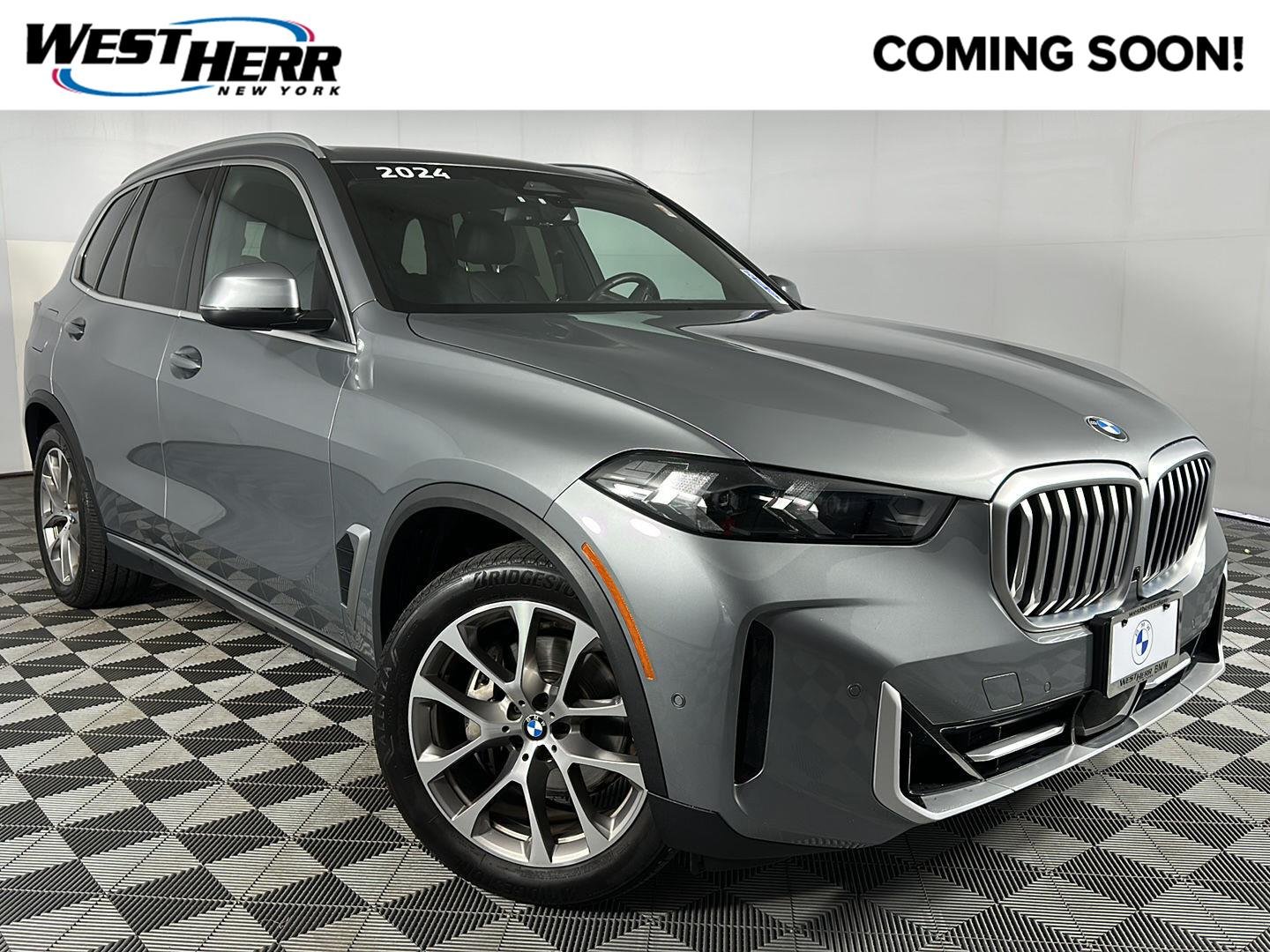 Used 2024 Skyscraper Grey Metallic BMW xDrive40i image 1