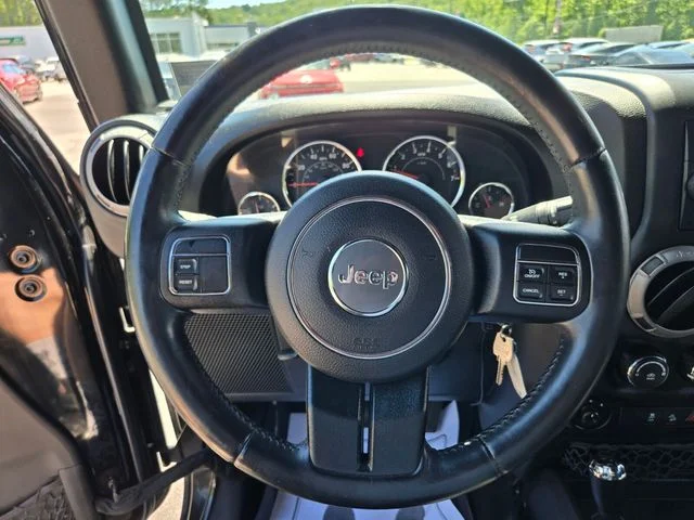 Used 2015 Black Jeep Unlimited Sport image 28