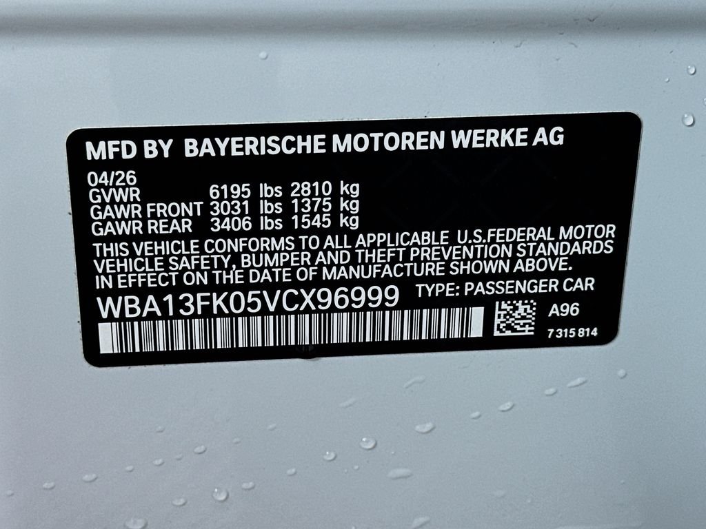New 2027 Mineral White Metallic BMW 550e xDrive image 24