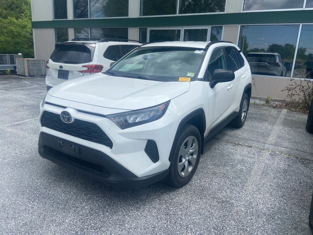 Used 2021 Super White Toyota LE image 3
