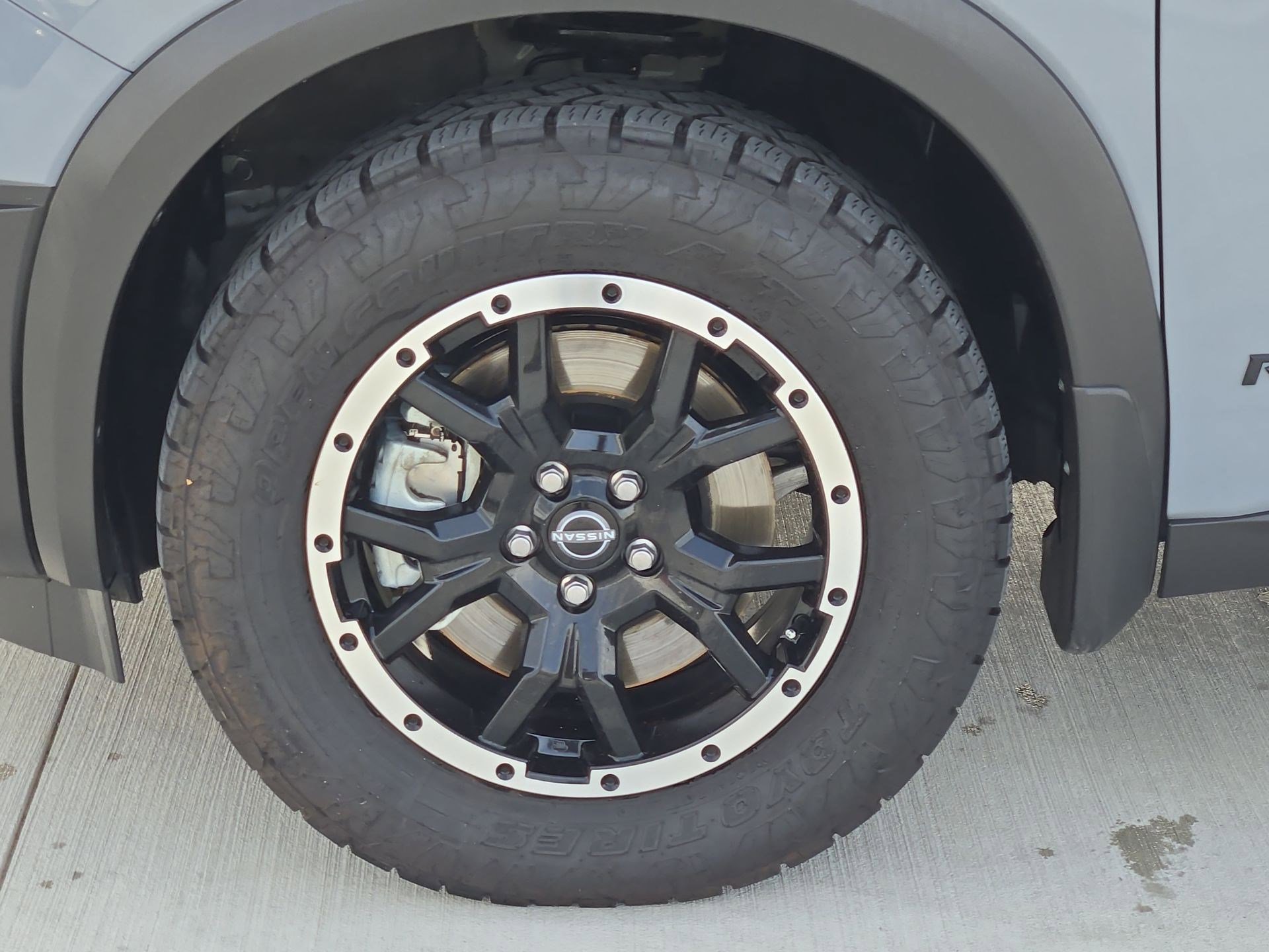 Used 2025 Solid Gray/Super Black Nissan Rock Creek image 11