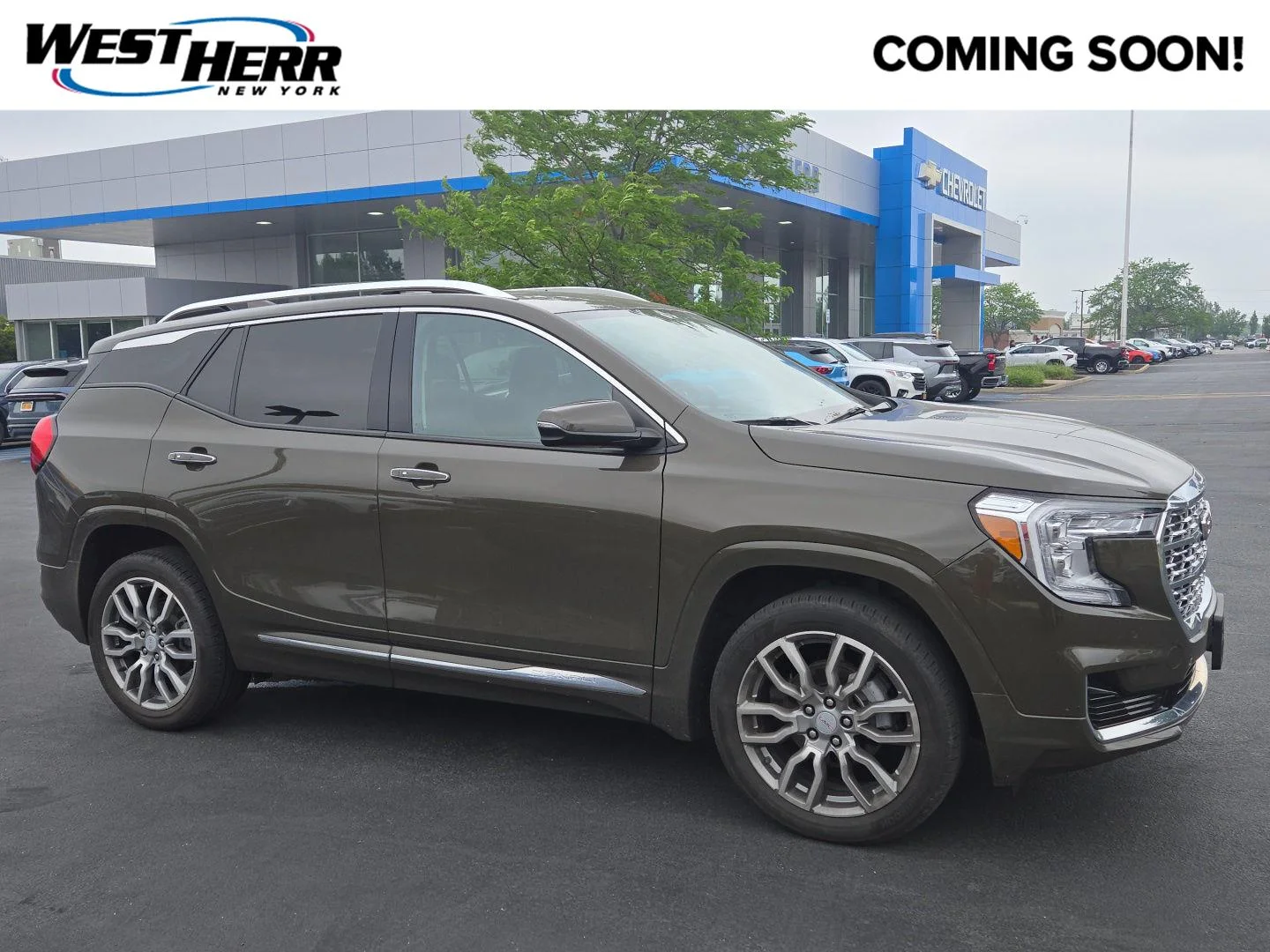 Used 2023 Deep Bronze Metallic GMC Denali image 1