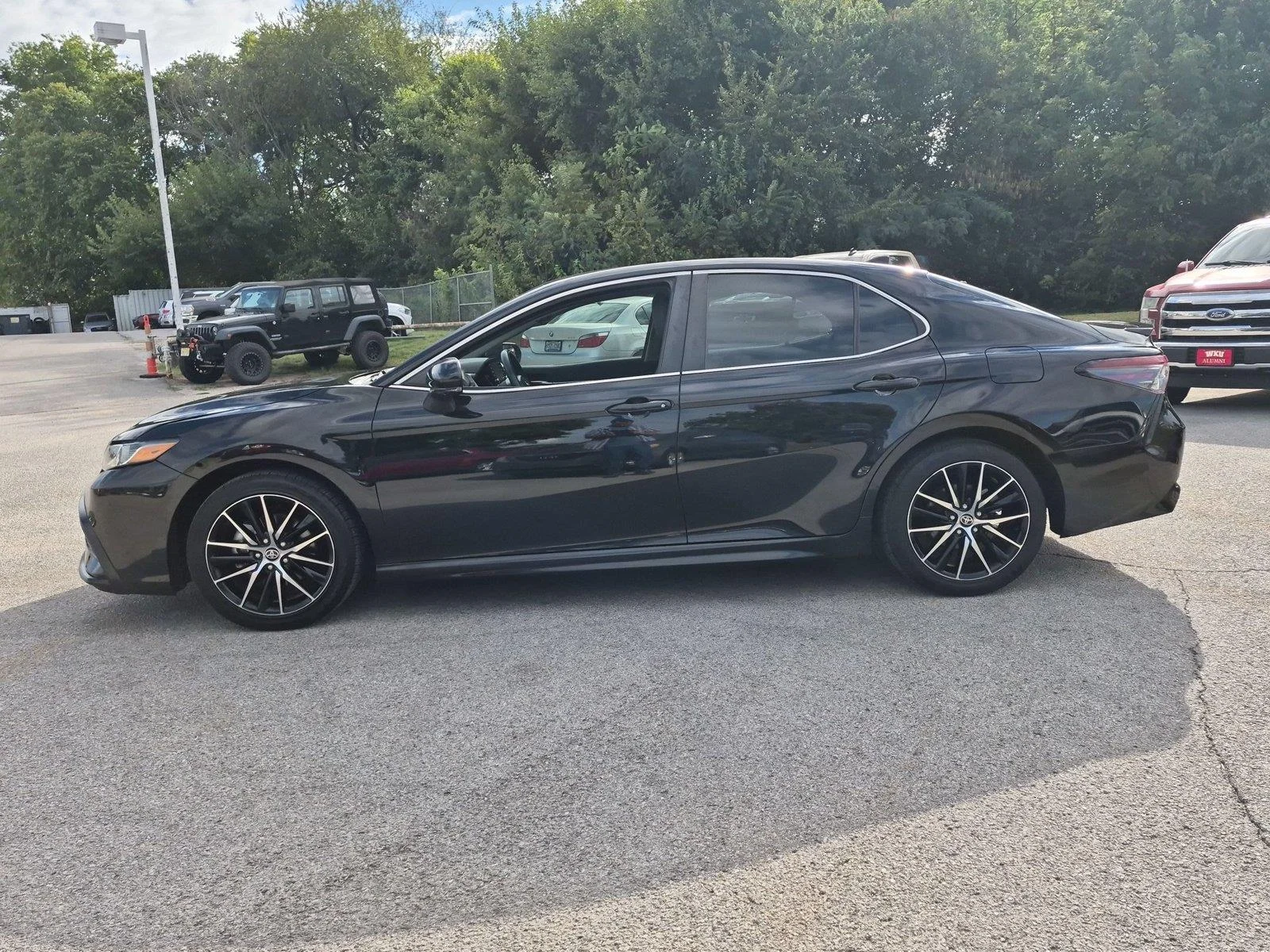 Used 2024 Midnight Black Metallic Toyota SE image 2