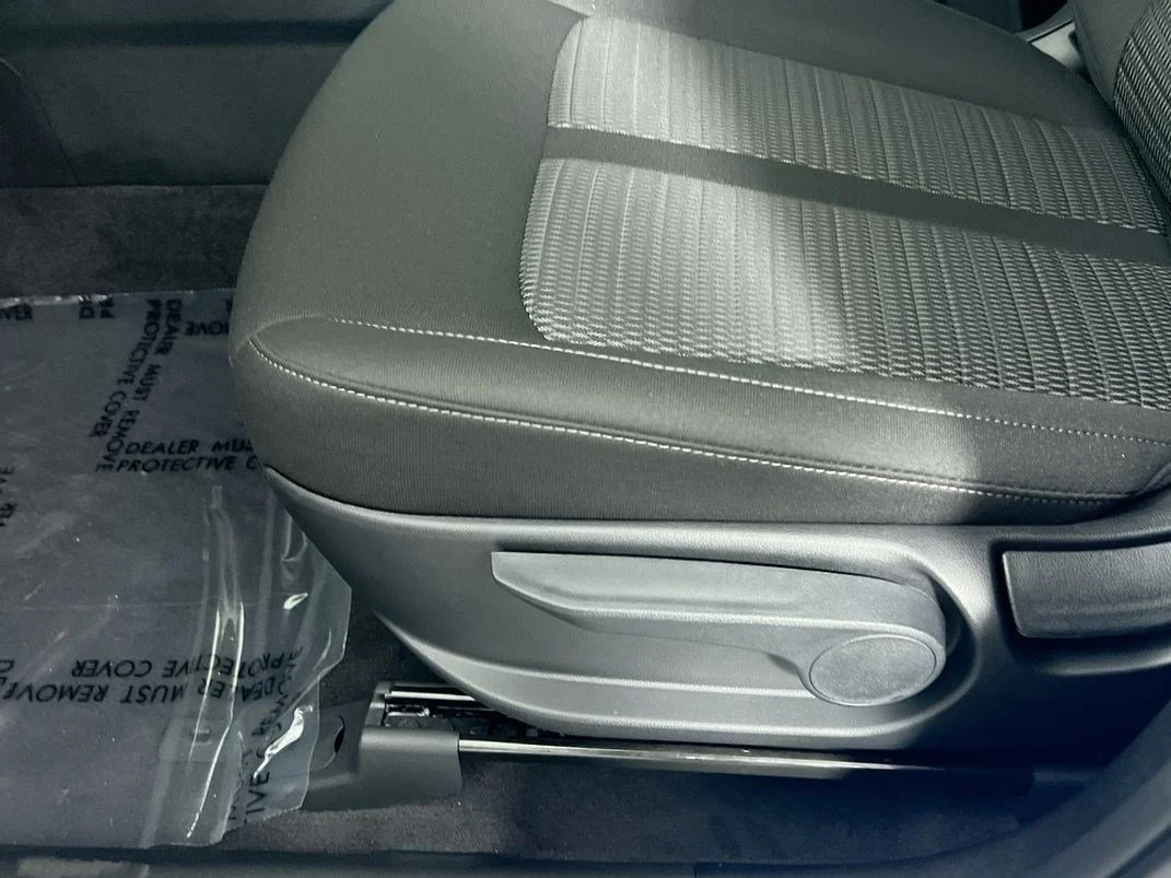 New 2026 Ivory Silver Kia LX image 13