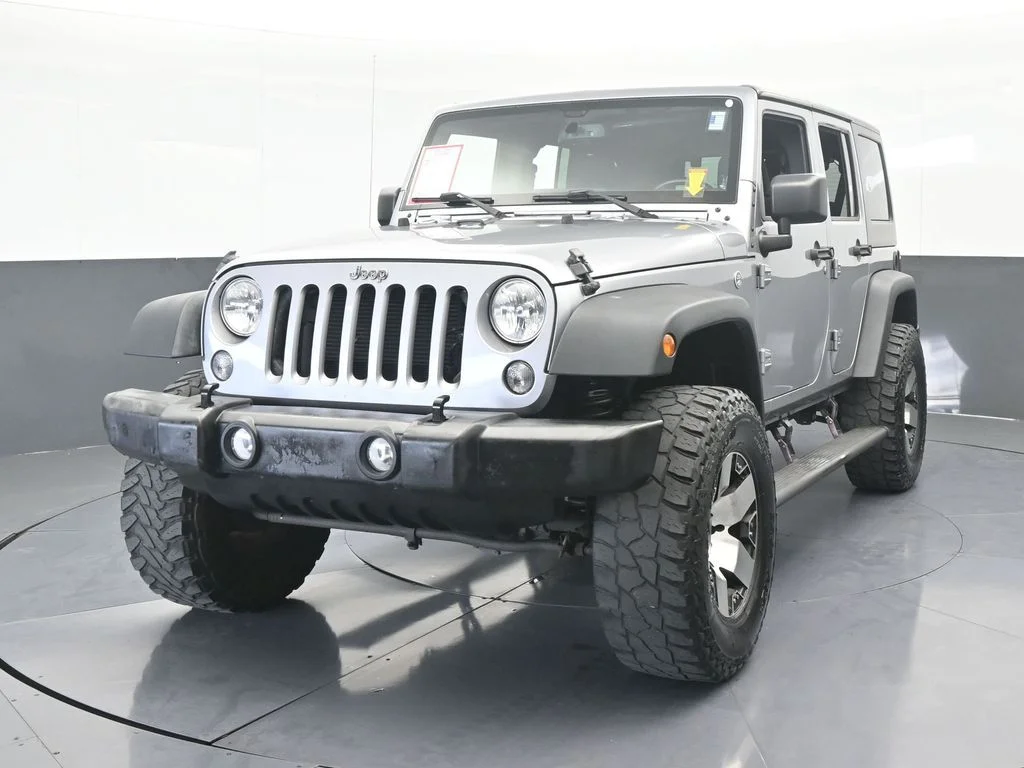 Used 2016 Billet Silver Metallic Clearcoat Jeep Unlimited Sport image 5
