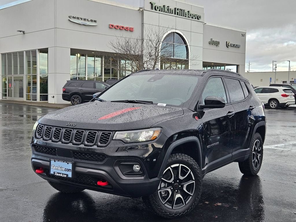 Used 2026 Diamond Black Crystal Pearlcoat Jeep Trailhawk image 1