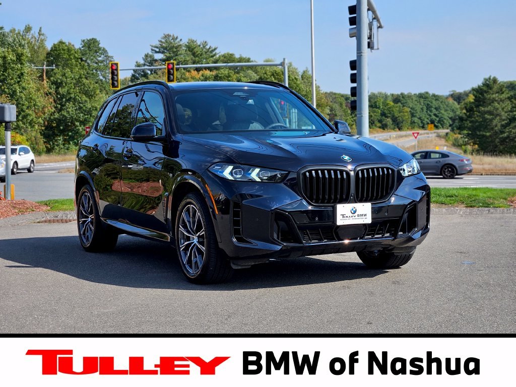 Certified Used 2025 Carbon Black Metallic BMW xDrive40i image 1