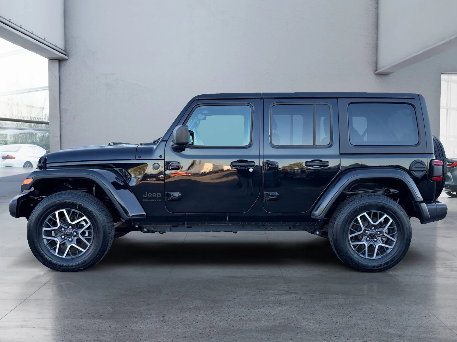 Used 2026 Diamond Black Crystal Pearl Jeep Sahara image 2