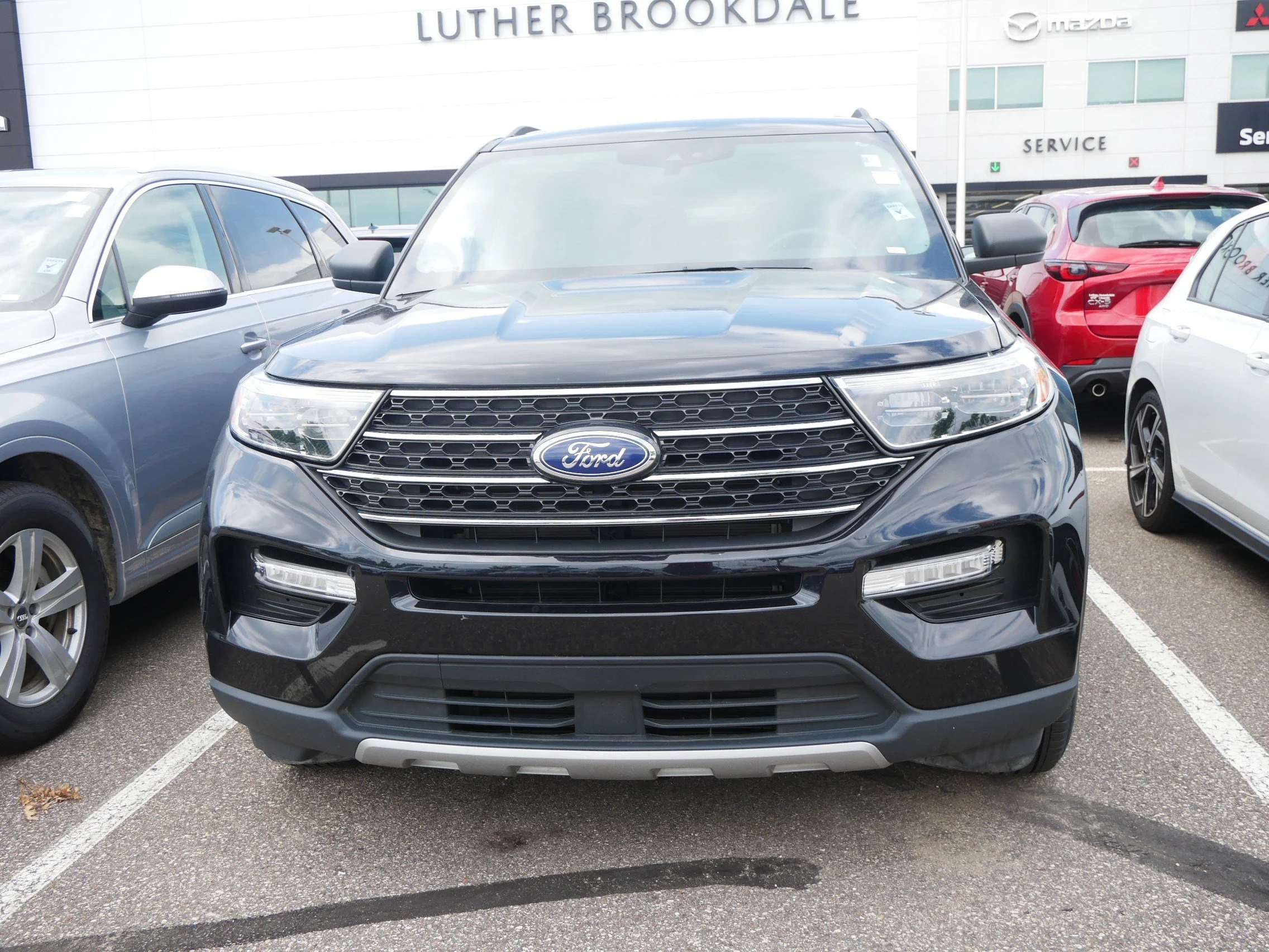 Used 2024 Ford Explorer XLT with VIN 1FMSK8DHXRGA50910 for sale in Brooklyn Center, Minnesota
