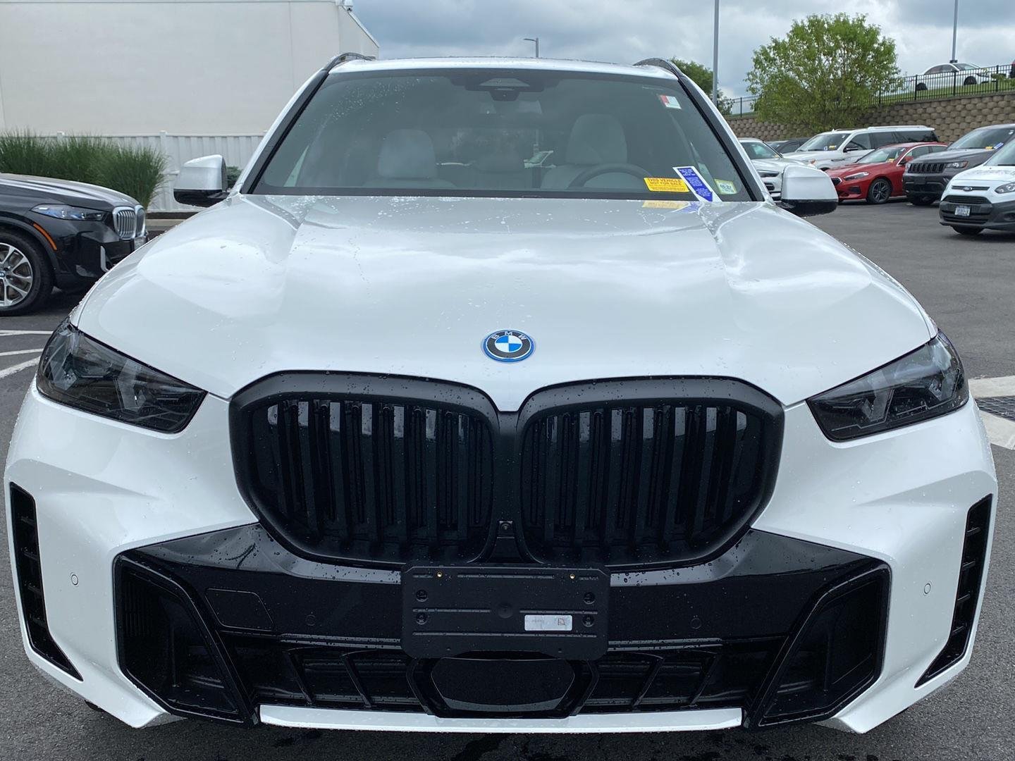Used 2026 Mineral White Metallic BMW xDrive50e image 5
