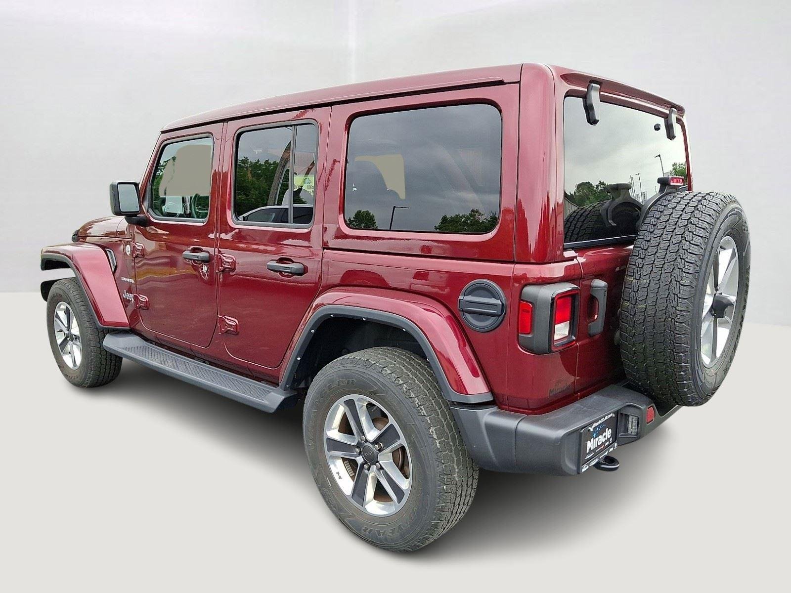 Used 2021 Snazzberry Pearlcoat Jeep Unlimited Sahara image 5