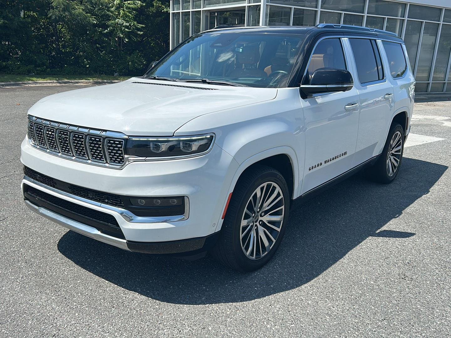 Used 2023 Bright White Clearcoat Jeep Series III image 1
