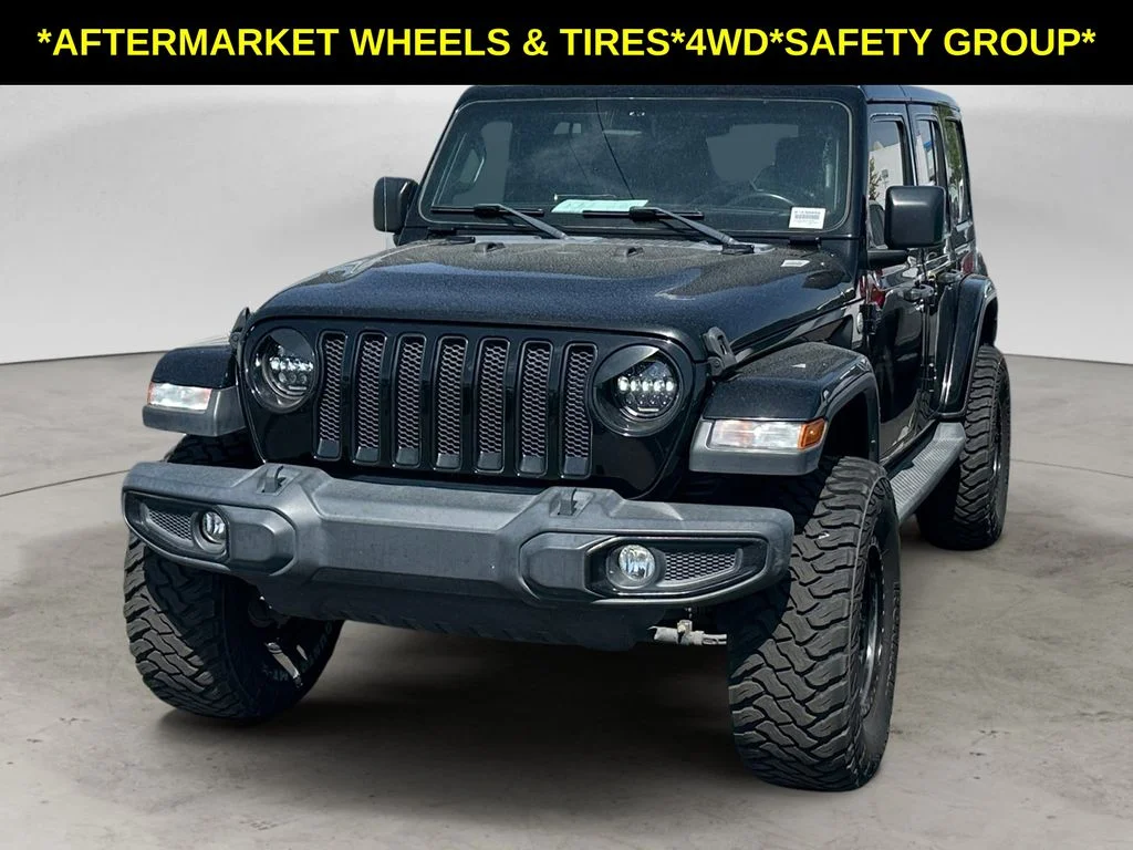 Used 2019 Black Jeep Unlimited Sahara image 1