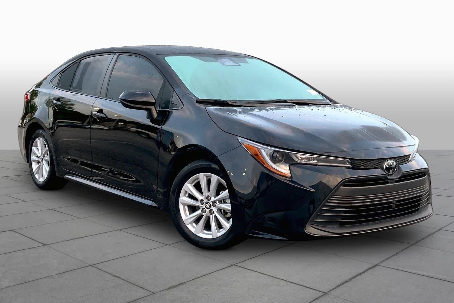 Used 2024 Midnight Black Metallic Toyota LE image 3
