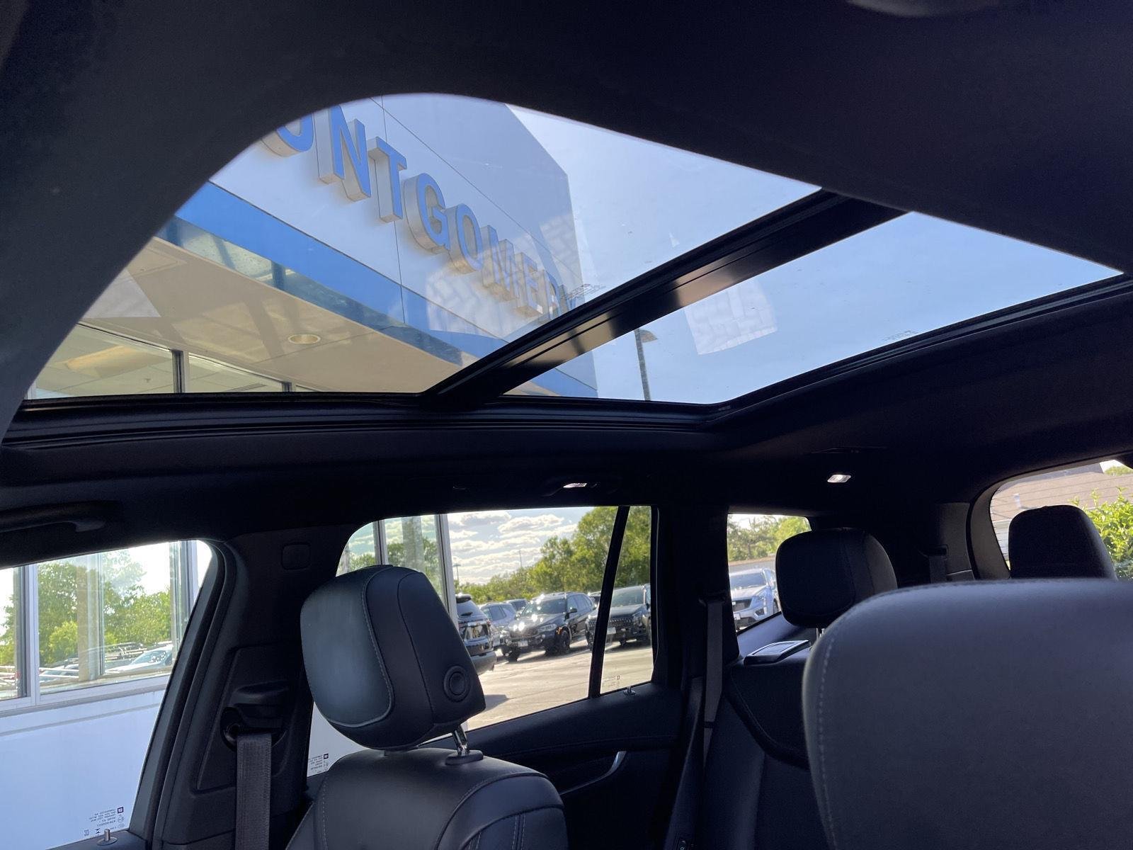 Used 2024 Opulent Blue Metallic Cadillac Sport image 29