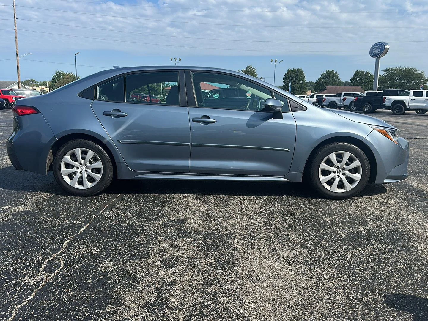 Used 2020 Celestite Gray Metallic Toyota LE image 4