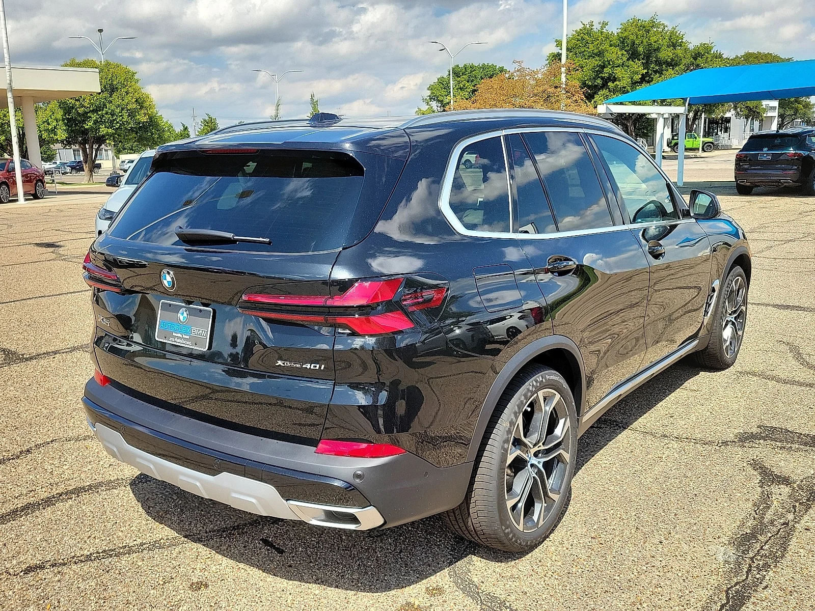 New 2026 Black Sapphire Metallic BMW xDrive40i All-Wheel Drive Sports Activity Vehicle image 4