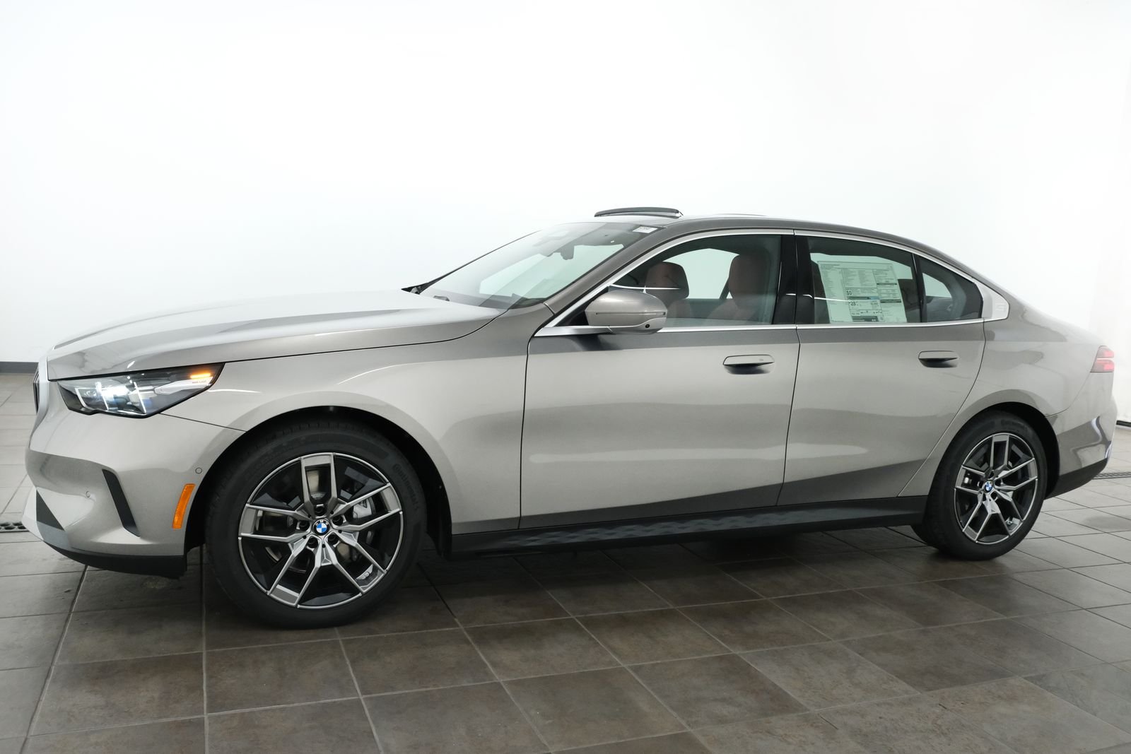 New 2027 Oxide Grey Metallic BMW 540i xDrive image 2