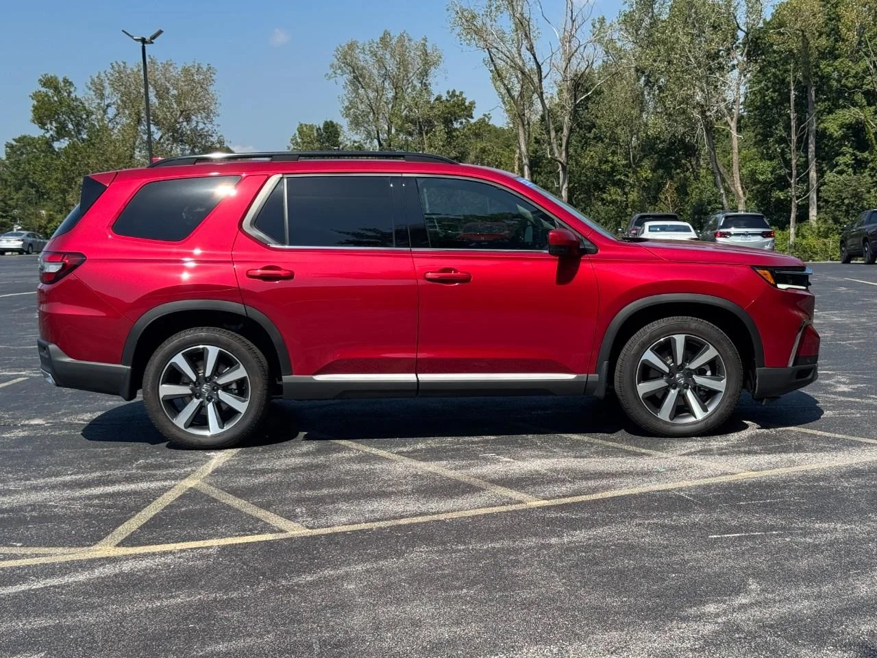 Certified Used 2025 Radiant Red Metallic II Honda AWD TRG image 3