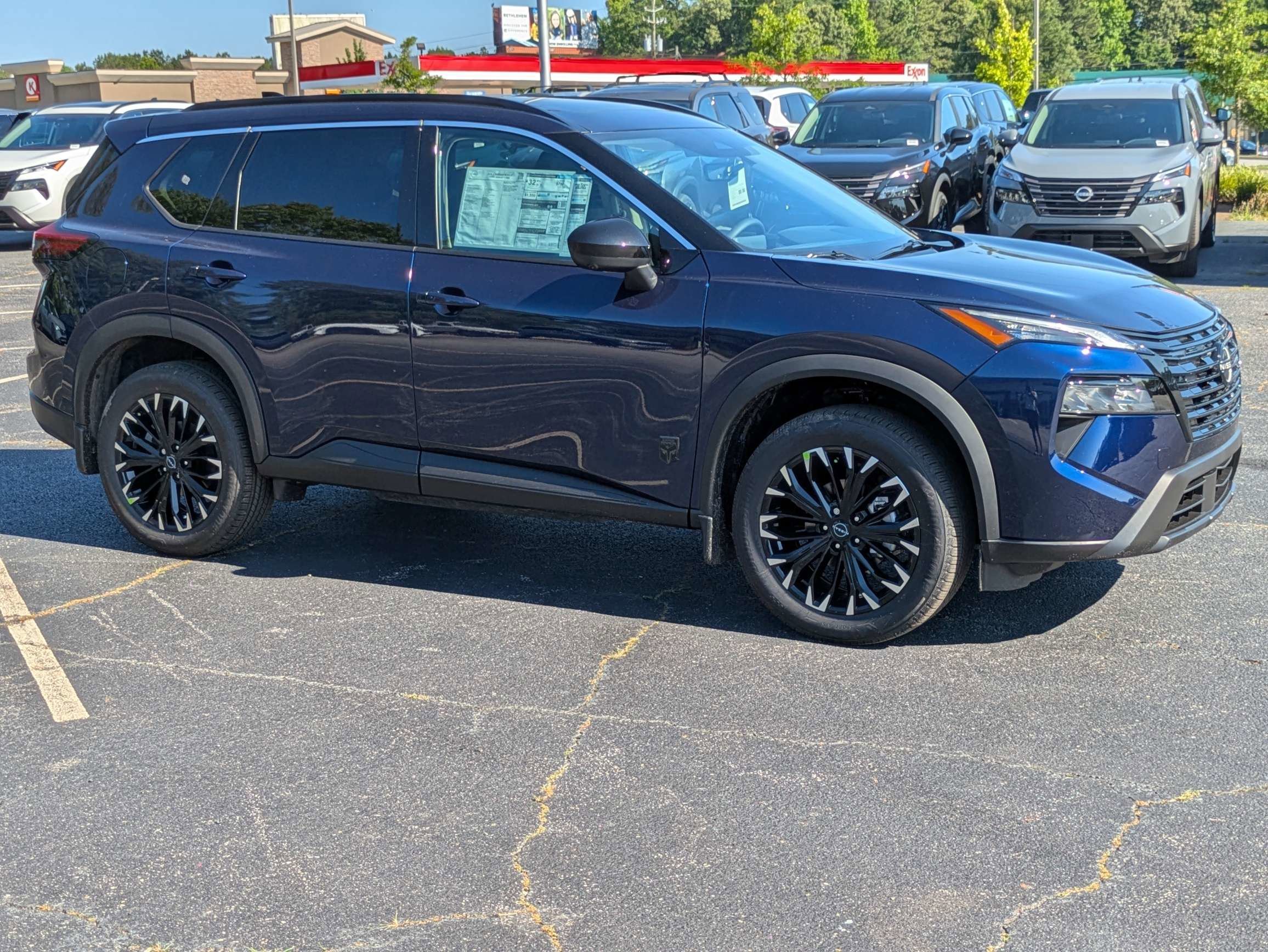 New 2026 Blue Nissan Dark Armor image 1
