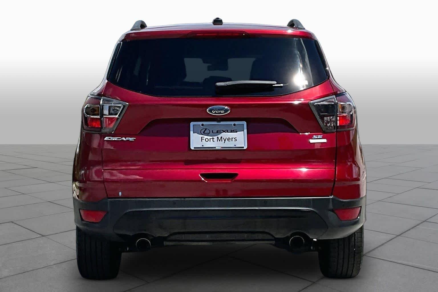 Used 2017 Ruby Red Metallic Tinted Clearcoat Ford SE image 6