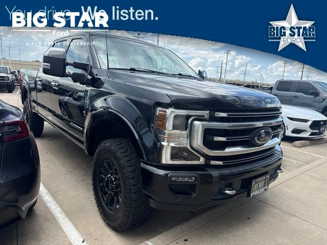 Used 2020 Agate Black Metallic Ford Platinum image 1