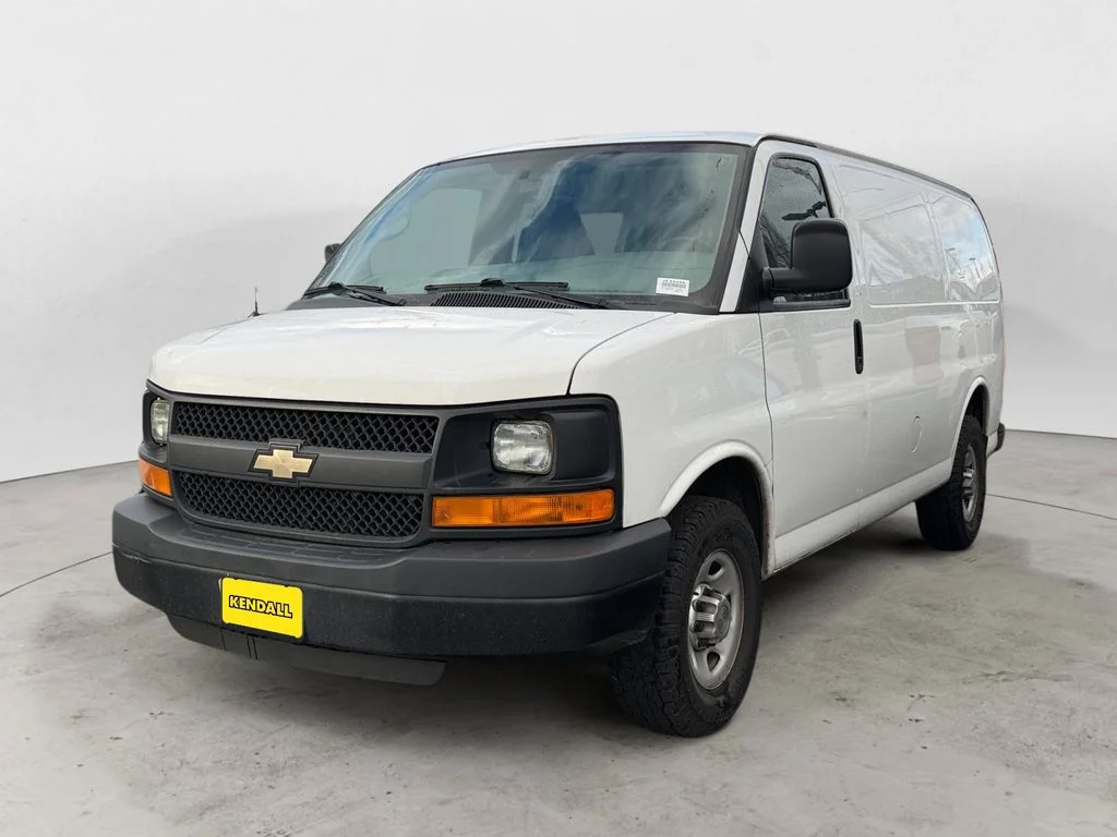 Used 2013 White Chevrolet Work Van image 1