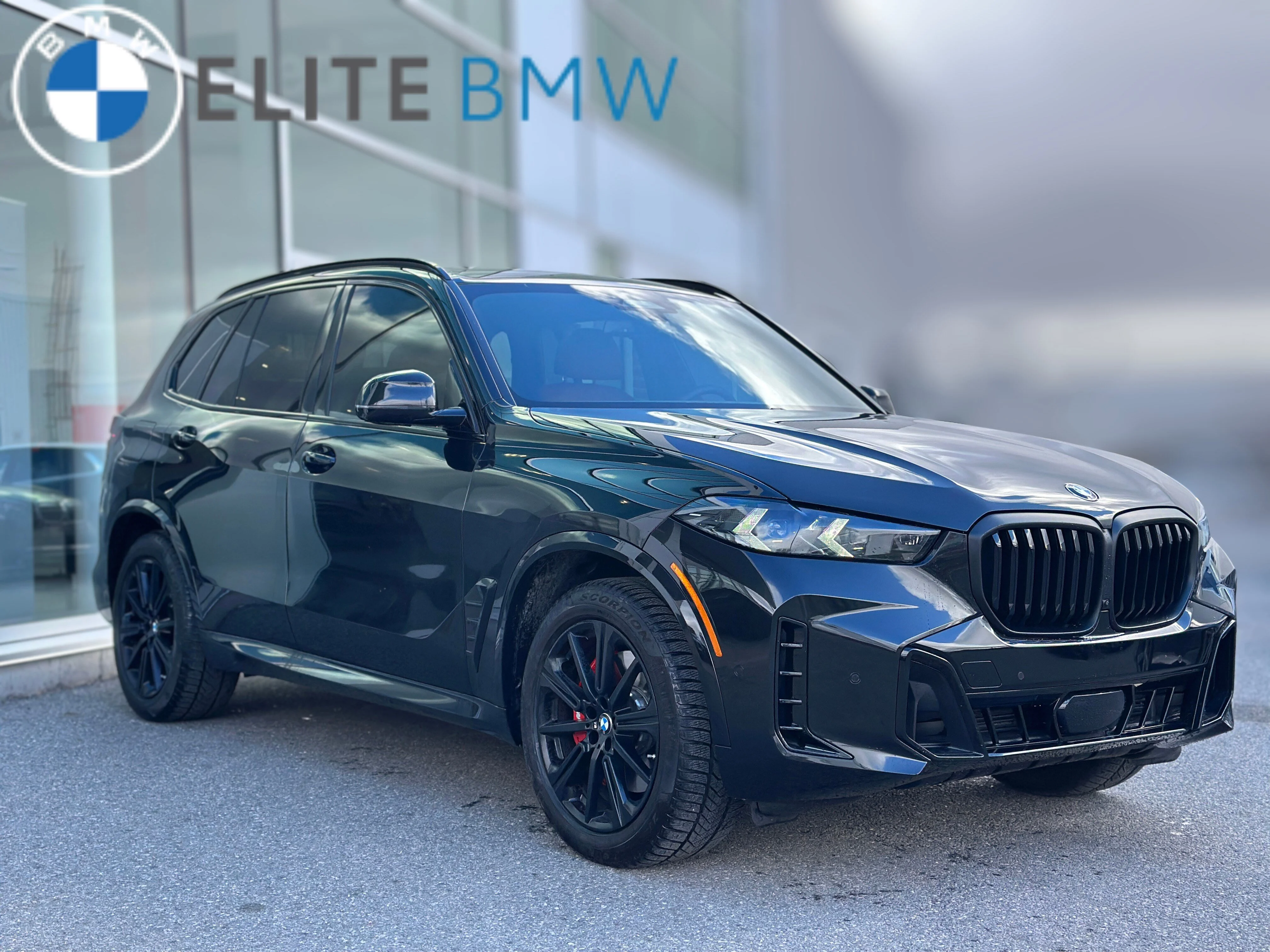 Used 2026 BLACK SAPPHIRE METALLIC BMW XDRIVE40I image 10