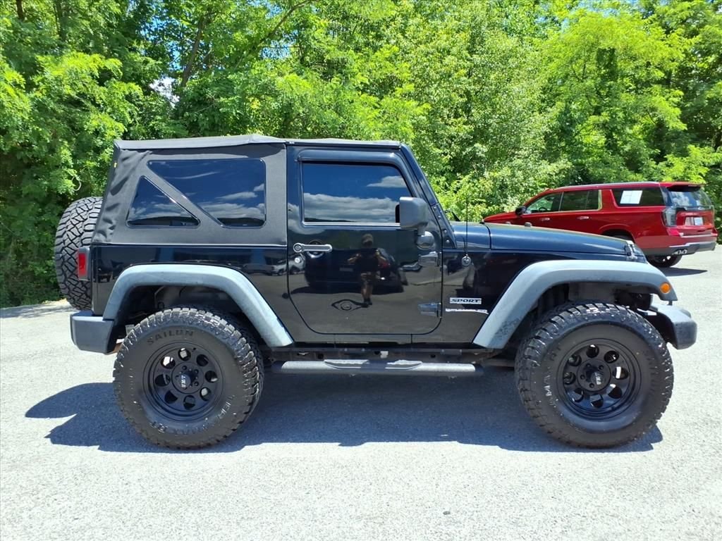 Used 2013 Black Jeep Sport image 7