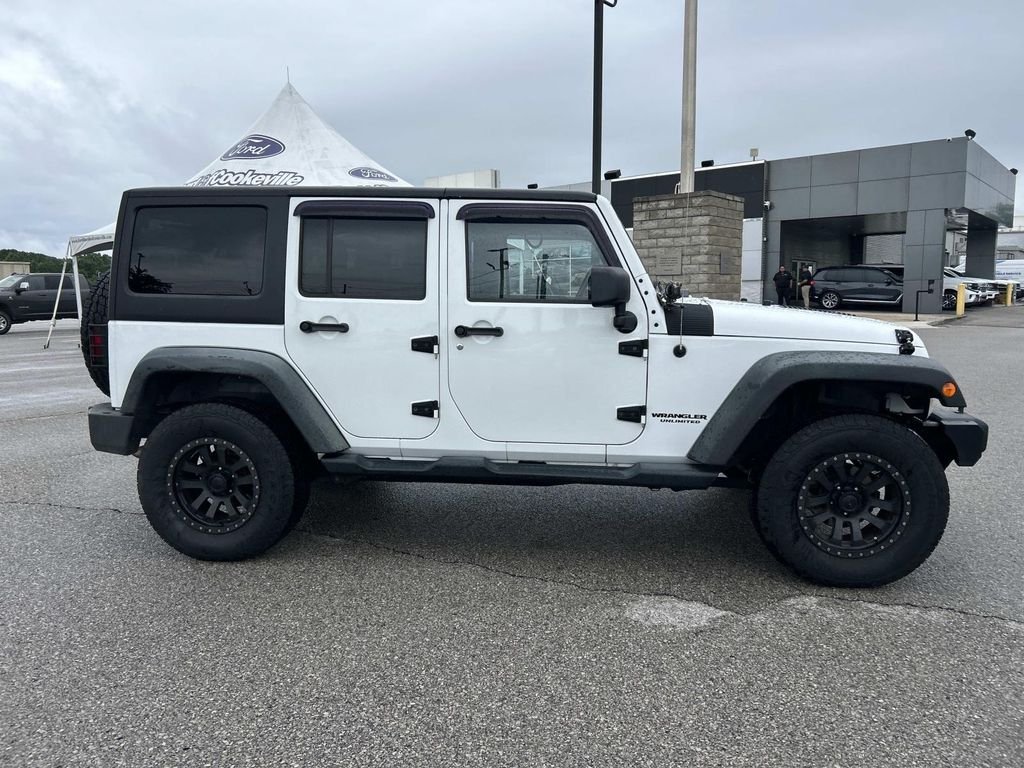 Used 2012 Bright White Jeep Unlimited Sport image 3