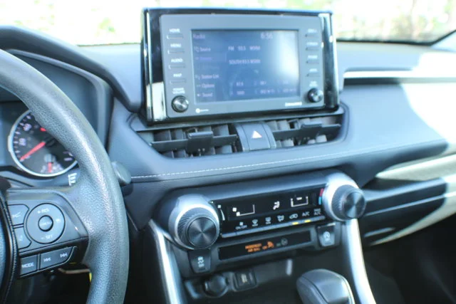 Used 2021 Super White Toyota LE image 9