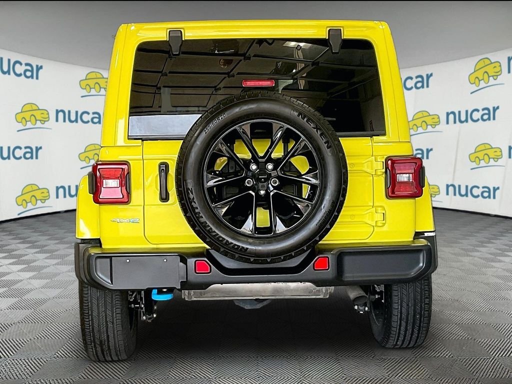 Used 2024 Yellow Jeep Sahara 4xe image 5