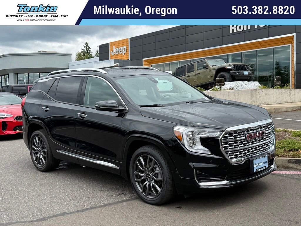 Used 2022 Ebony Twilight Metallic GMC Denali image 1