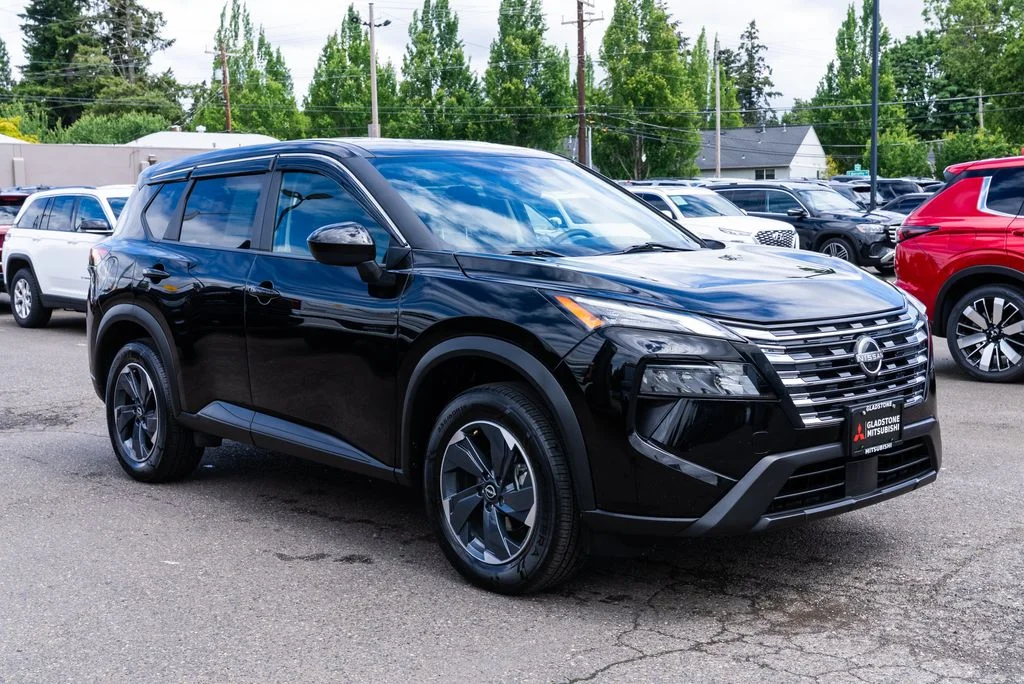 Used 2024 Black Nissan SV image 1