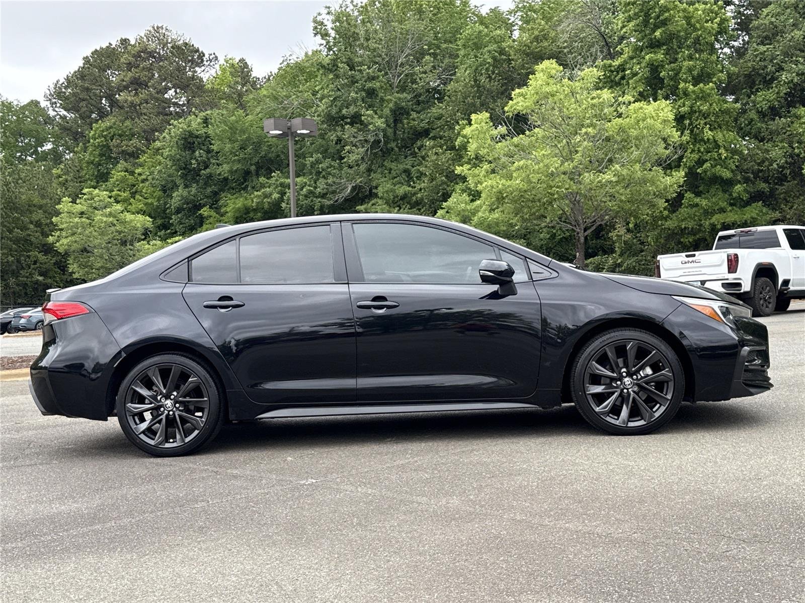 Used 2023 Midnight Black Metallic Toyota SE image 26