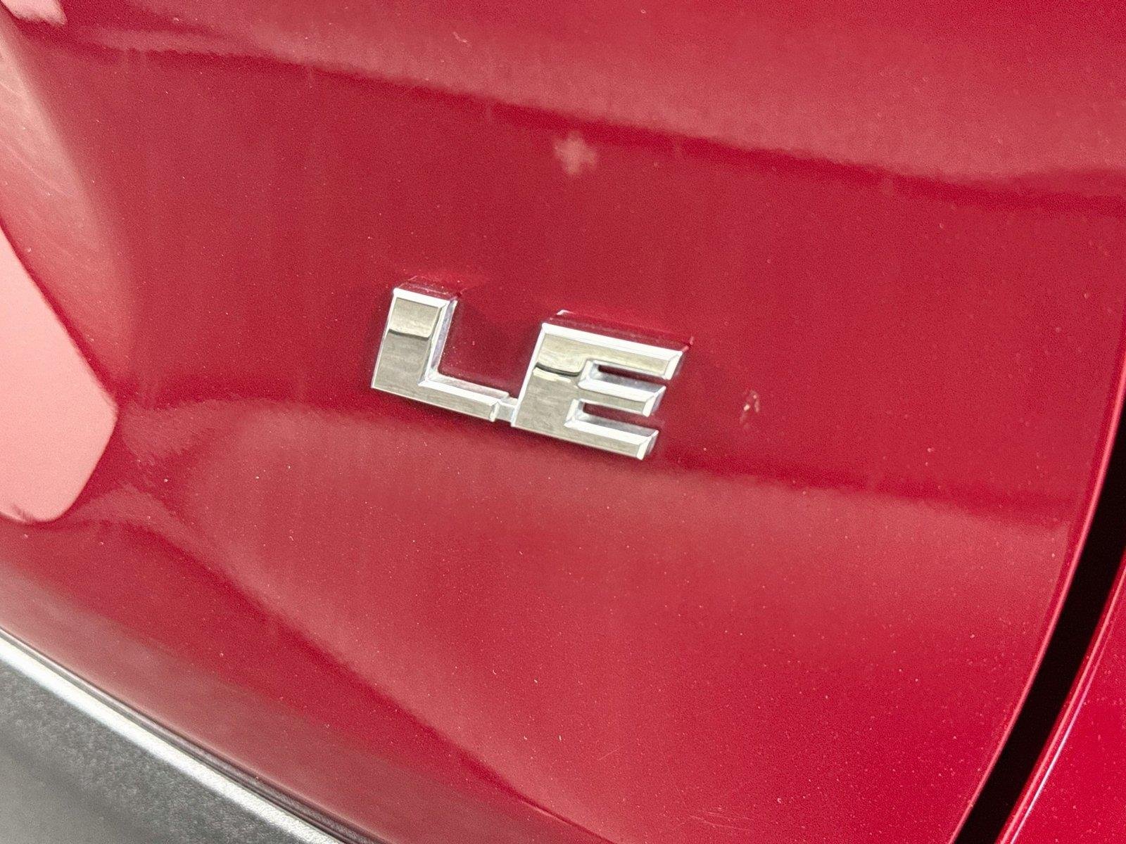 Used 2021 Ruby Flare Pearl Toyota LE image 13