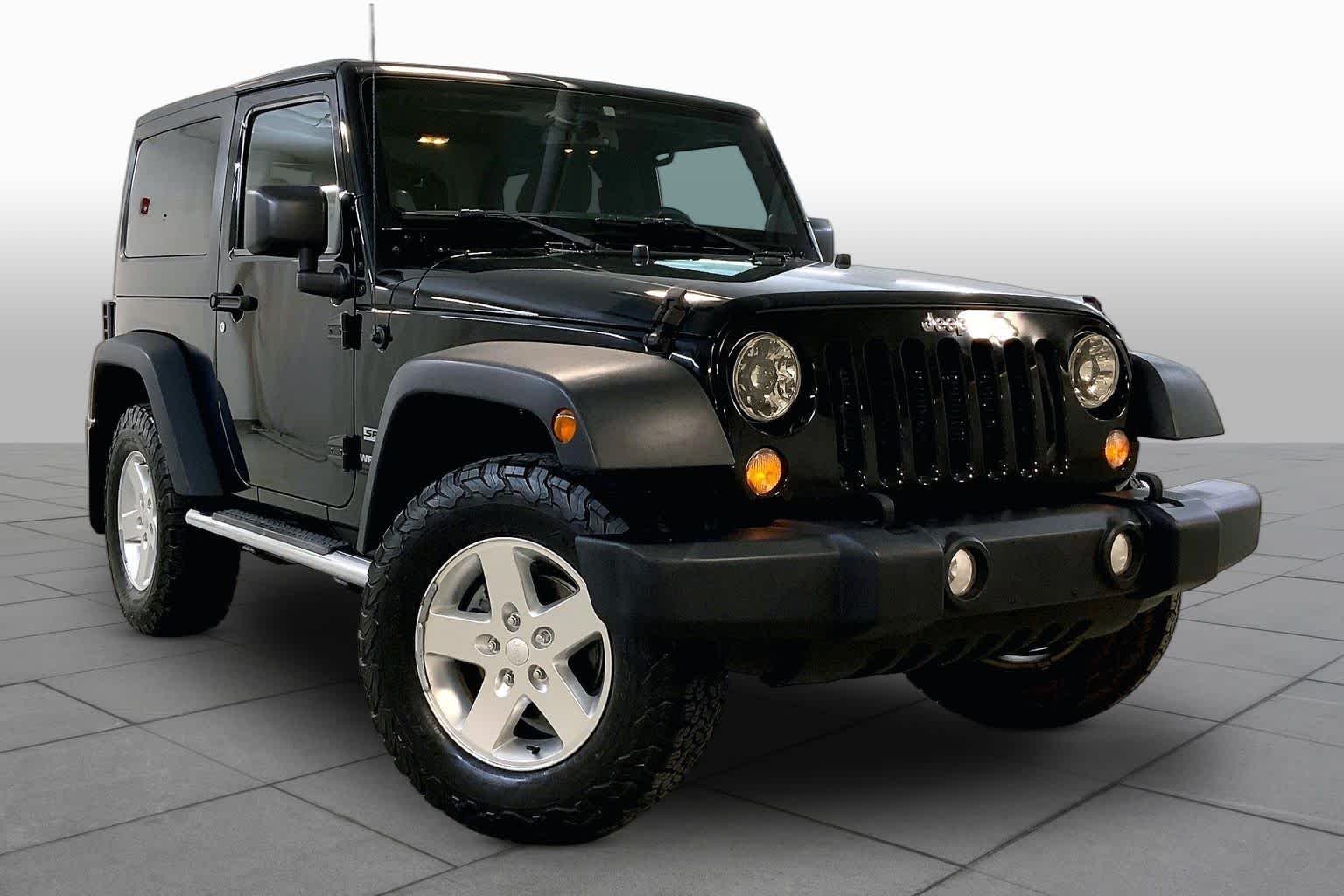 Used 2014 Jeep Wrangler Sport with VIN 1C4AJWAG5EL288264 for sale in Kansas City