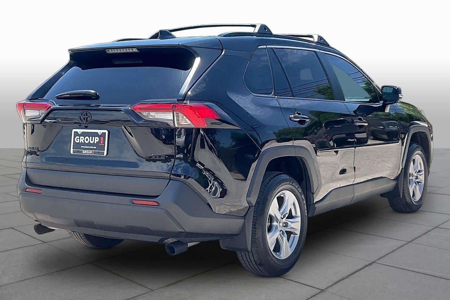 Used 2025 Midnight Black Metallic Toyota XLE image 13